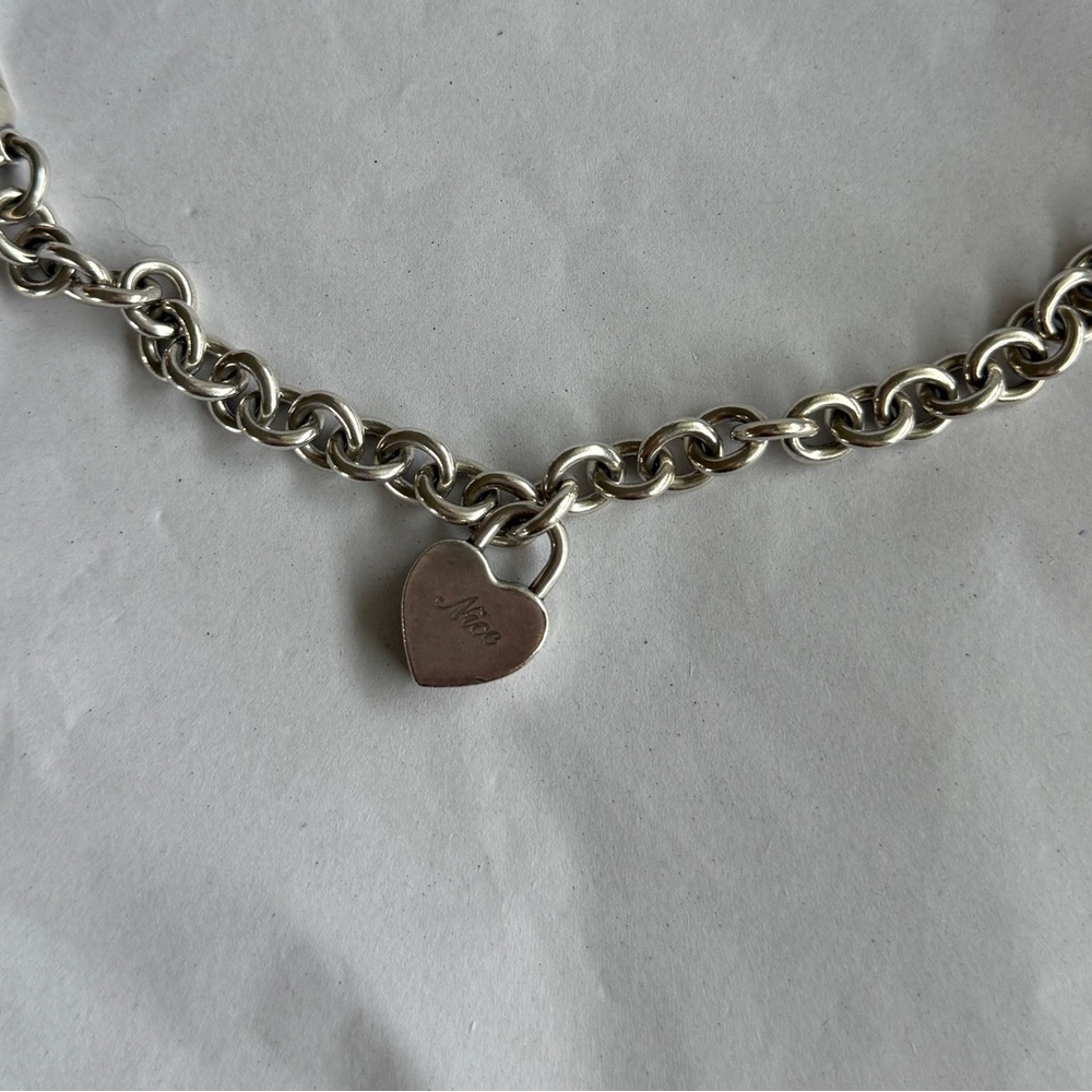 Tiffany & Co. Naughty or Nice Padlock Charm Bracelet